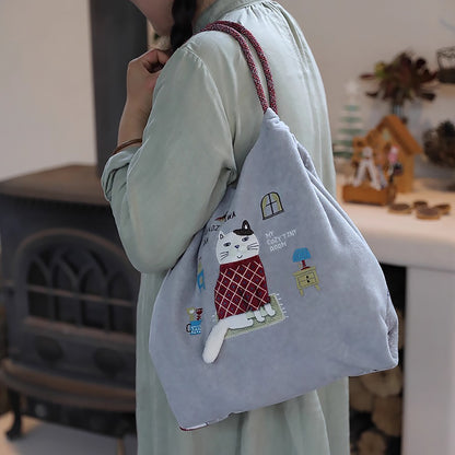 Sac de cours Kusuguru en tissu polaire avec broderie